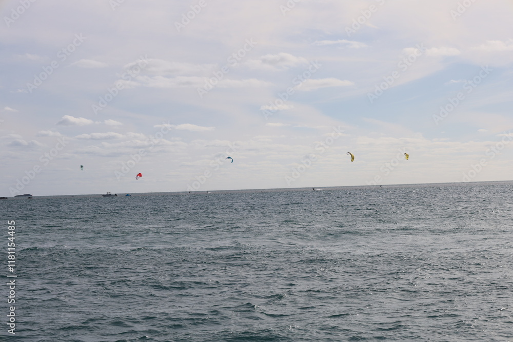 Paroplane at the distance blue sky blue ocean Paroplane at the distance blue sky blue ocean