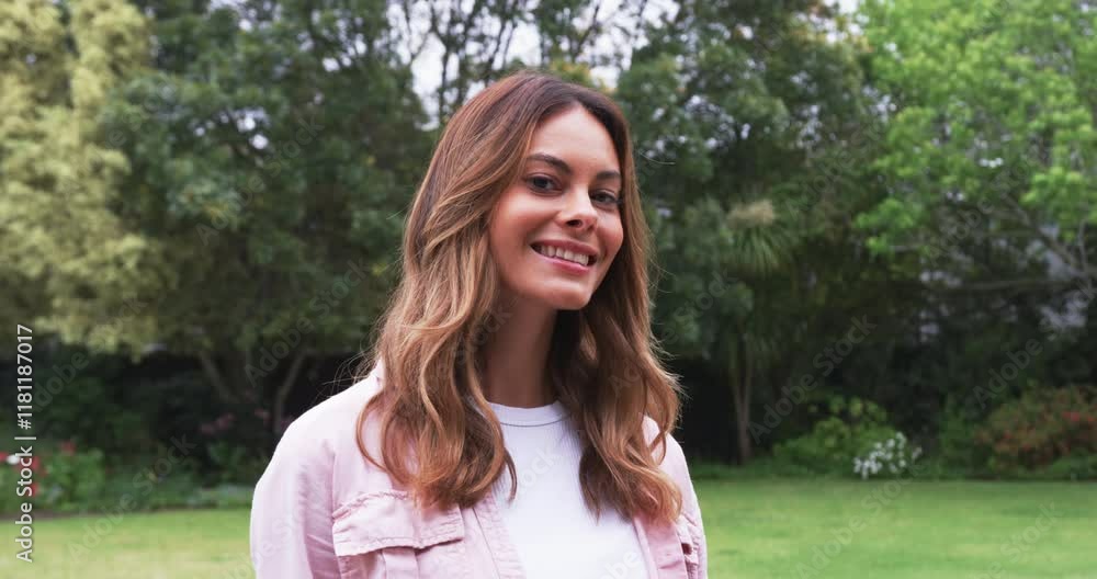 Portrait of smiling woman enjoying outdoor garden Portrait of smiling woman enjoying outdoor garden