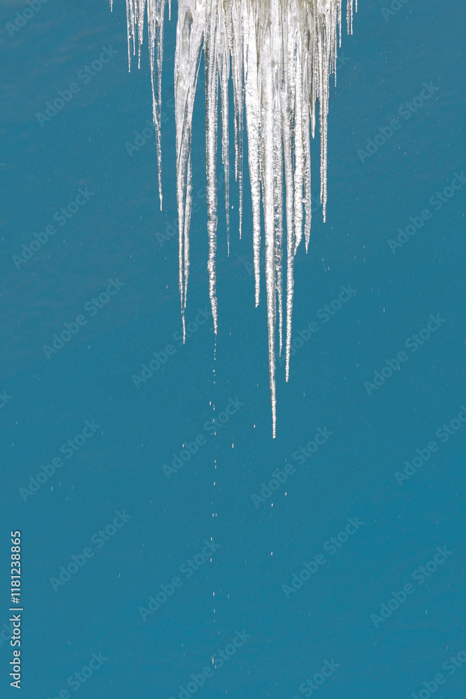 Winter Icicles Hanging with background of the blue sky