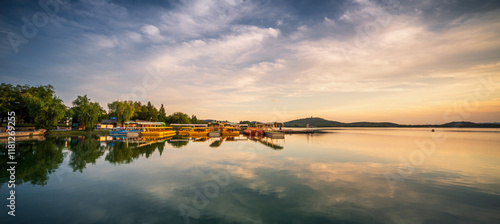 Obraz na plátně Serene Evening at Lake Boating Dock