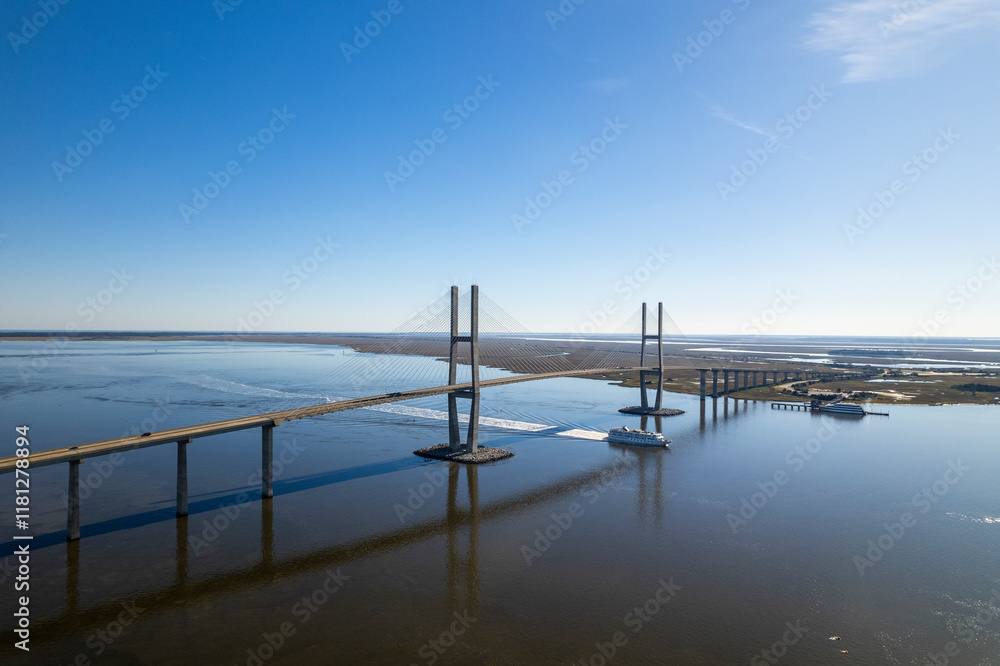 Aerial view of the serene Sidney Lanier Bridge spanning the Brunswick River with calm reflections, Brunswick, Georgia, USA. Aerial view of the serene Sidney Lanier Bridge spanning the Brunswick River with calm reflections, Brunswick, Georgia, USA.