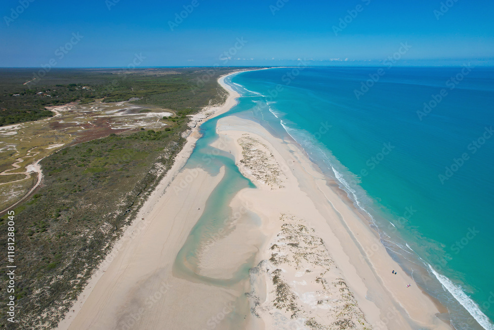 Aerial view of beautiful Coconut Well Lagoon with tranquil turquoise waters and sandy shores, Kimberley Region, Australia. Aerial view of beautiful Coconut Well Lagoon with tranquil turquoise waters and sandy shores, Kimberley Region, Australia.
