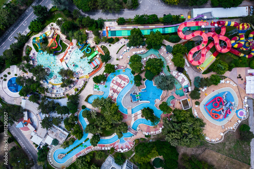 Aerial view of colorful water slides and pools surrounded by greenery, Albena resort, Bulgaria. photo