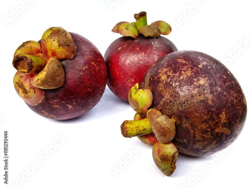 Purple Mangosteens isolated on white background, Fresh highest variety Mangosteens on White Background With clipping path. photo