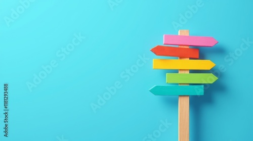 Colorful Directional Signs Against Blue Background