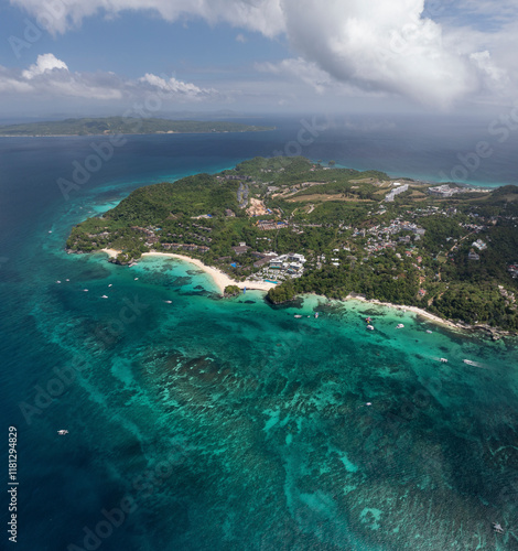 Aerial view of beautiful tropical island with clear turquoise water and serene beach, Malay, Aklan, Philippines. photo