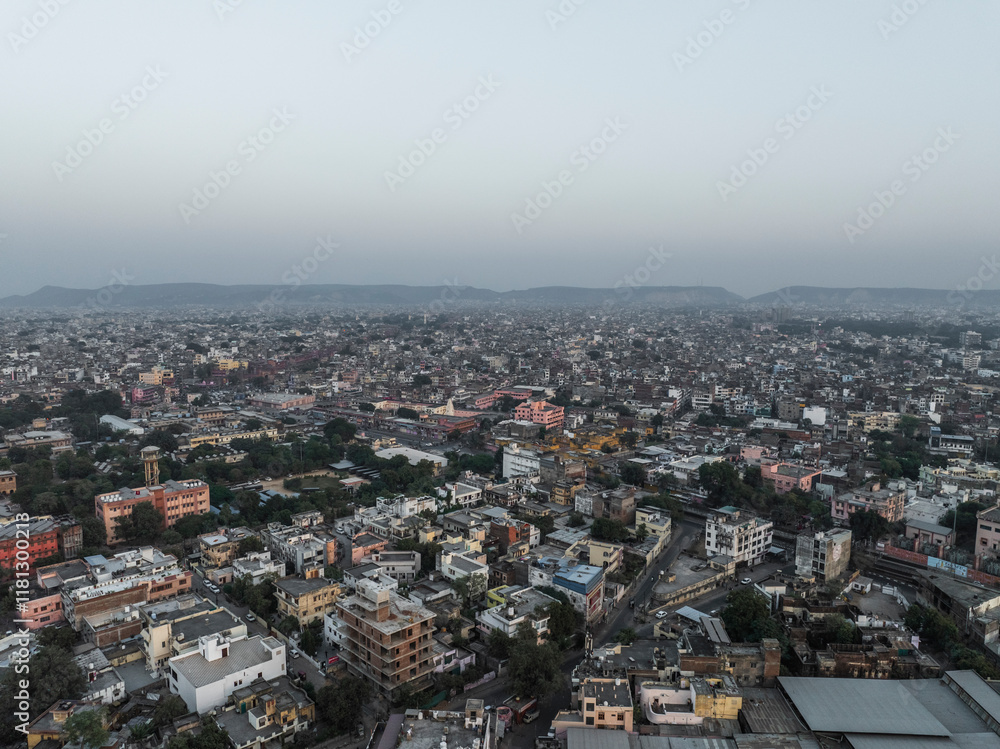 Aerial view of vibrant cityscape with dense buildings and modern skyline, Sindhi Camp, Jaipur, India. Aerial view of vibrant cityscape with dense buildings and modern skyline, Sindhi Camp, Jaipur, India.