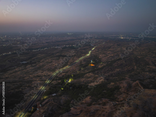 Aerial view of the beautiful city lights and serene terrain at dusk, Jodhpur, Rajasthan, India. photo