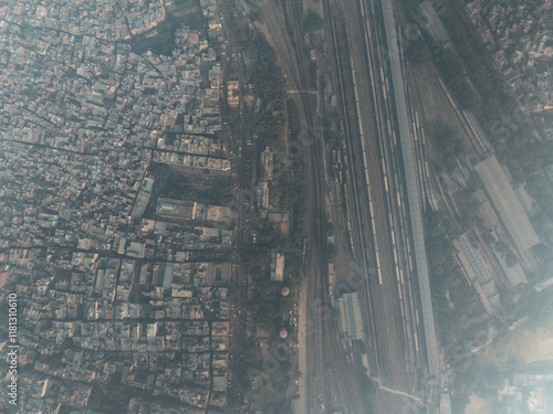 Aerial view of bustling Pahar Ganj with vibrant railway tracks and dense urban architecture, New Delhi, India. photo