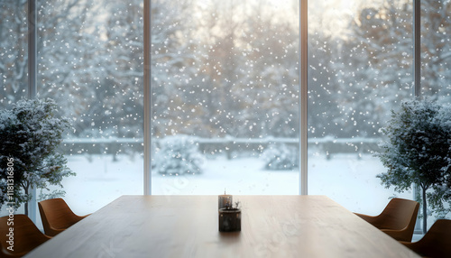 An empty table with a winter scene visible through the window in the background.