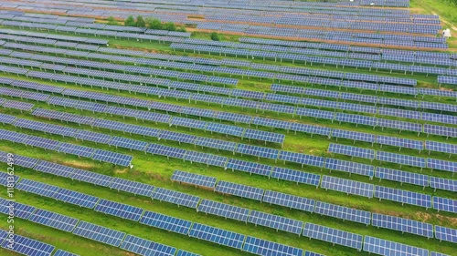 The biggest solar panel farm of the world in Taihang Mountain slopes, showcasing renewable energy innovation. China, Loess Plateau. photo