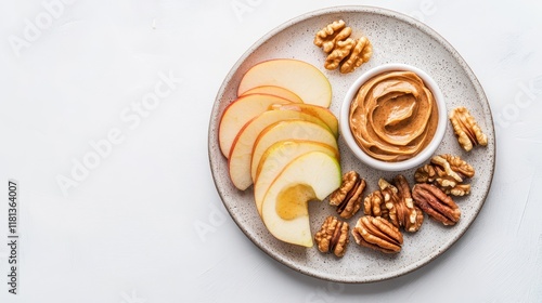 Sliced Apples with Almond Butter and Nuts on Plate