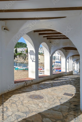 'Carrer de les Voltes', seafront promenade In the Historic and Tourist Town of Calella de Palafrugell, Costa Brava, Catalonia photo