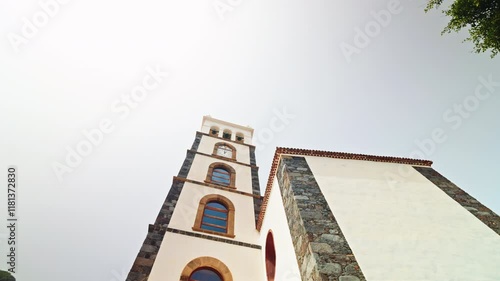 Close up shot of the bell tower of the church of Santa Ana in Tenerife, Canary Island, Spain. photo