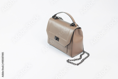 Beige leather women's handbag, Women's bag, beige women's bag. Women's bag isolated on white background. The bag is isolated on a white background. photo