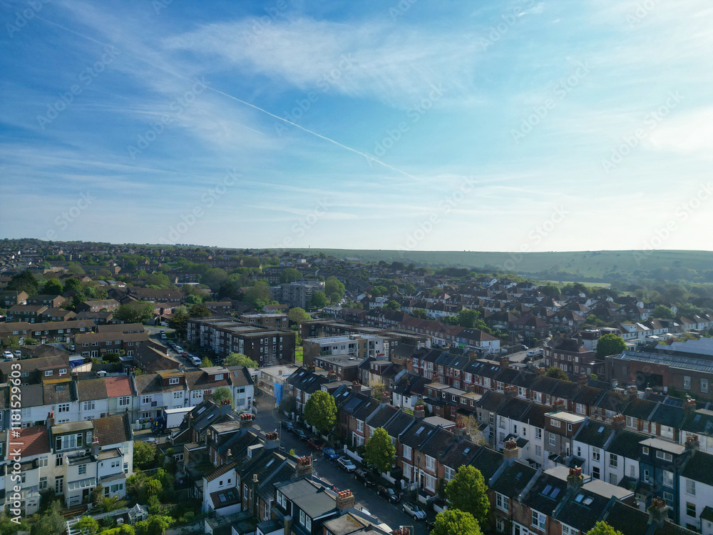 Fototapeta premium Beautiful and Attractive British Tourist Attraction and Downtown and Central Brighton seaside resort and Beach City of East Sussex, England GB. Footage Captured with Drone's Camera on May 9th, 2024