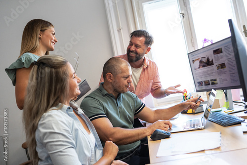 In their modest office, a group of independent journalists tirelessly work, driven by a shared passion for truth and storytelling.	 photo