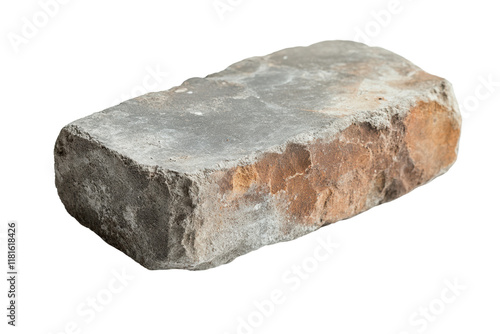 A single, rugged stone block with rough texture and natural color variations, ideal for construction or landscaping visuals. photo