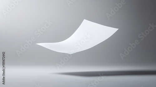 A pristine sheet of paper floating mid air against a muted gray background, perfectly centered and well lit. photo