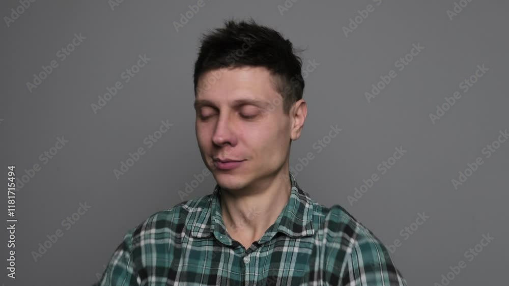 Man astonished on receiving good news using mobile phone Man astonished on receiving good news using mobile phone