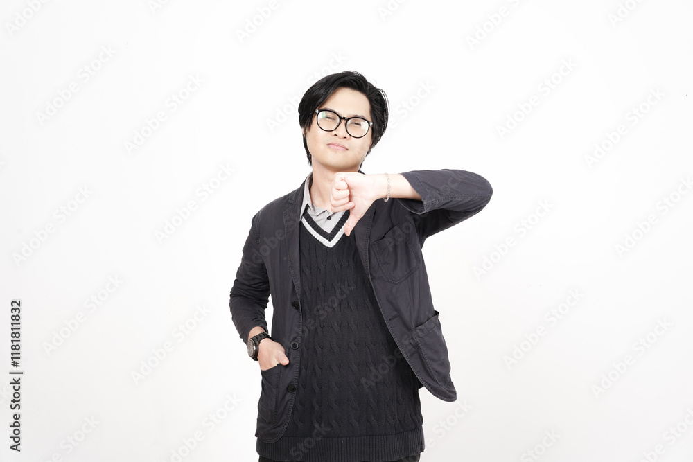 Showing Thumbs down sign Of Beautiful Asian Man Isolated On White Background Showing Thumbs down sign Of Beautiful Asian Man Isolated On White Background