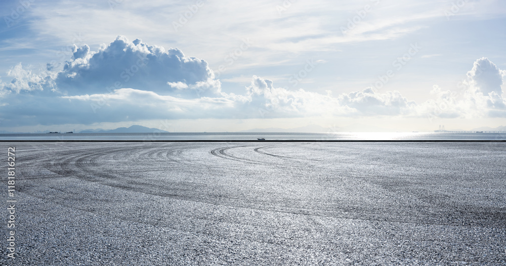 Asphalt road square and beautiful coastline with sky clouds nature landscape. Outdoor asphalt parking lot. Asphalt road square and beautiful coastline with sky clouds nature landscape. Outdoor asphalt parking lot.