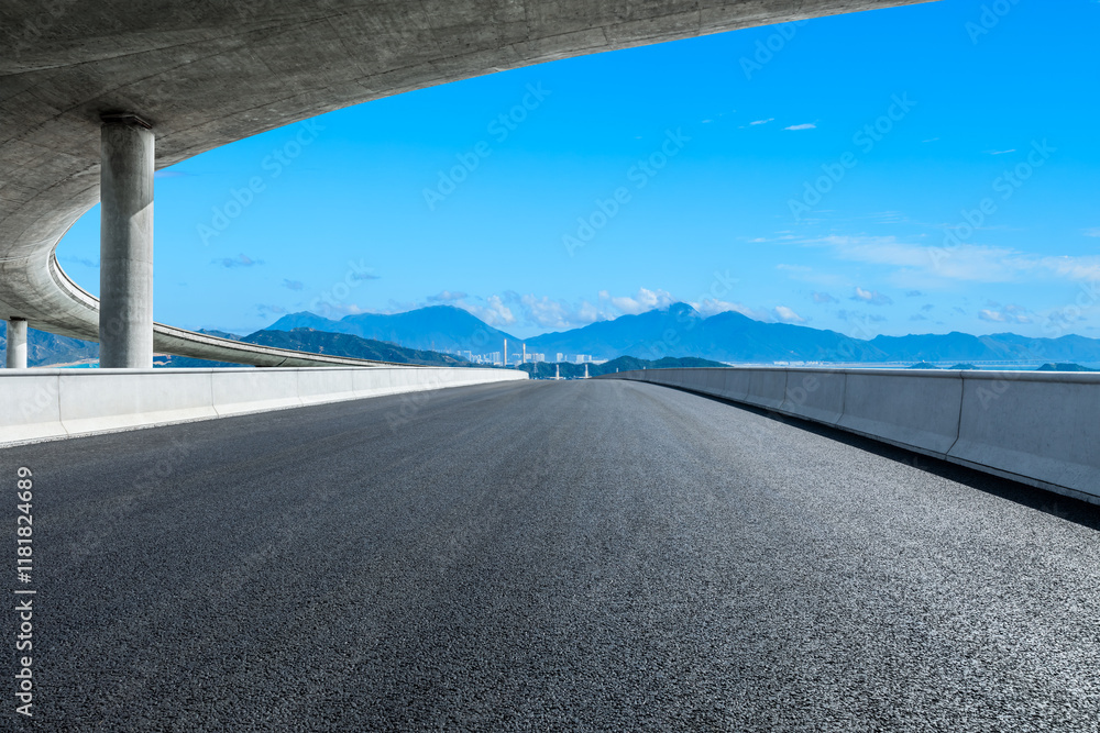 Naklejka premium Asphalt highway road and bridge with mountain nature landscape at dusk. Outdoor road background.