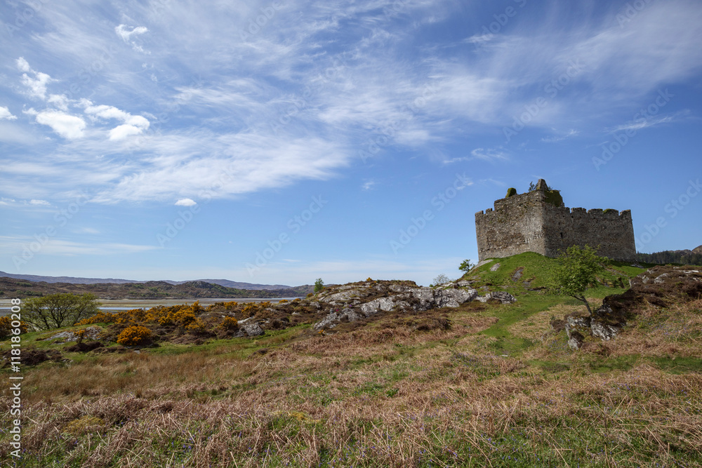 Majestic Castle Tioram in Scotland surrounded by scenic landscape Majestic Castle Tioram in Scotland surrounded by scenic landscape