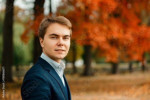Close-up of a businessman with a blurred nature background, symbolizing focus and professionalism