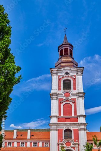 Courtyard and bell tower of the basilica Collegiate Church or simply know as Fara. It is a Roman Catholic basilica located in the heart of the Old Town district in Poznan  Europe  Poland
