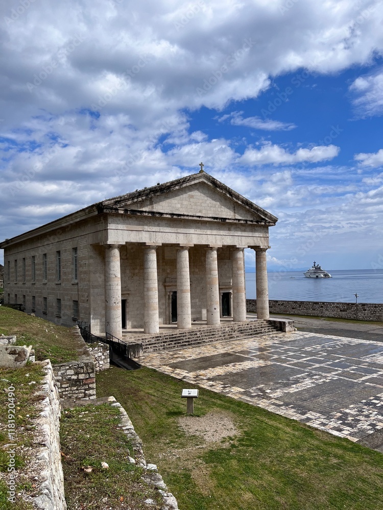 Fototapeta premium historical building on top of the cliff with sea view background