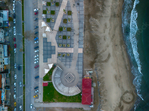 Aerial View of Urban Beachfront with Amphitheater and Parking. High-angle, full shot of a modern urban waterfront area. Karasu Sakarya Adapazari Turkiye Turkey Drone shot aerial view  photo