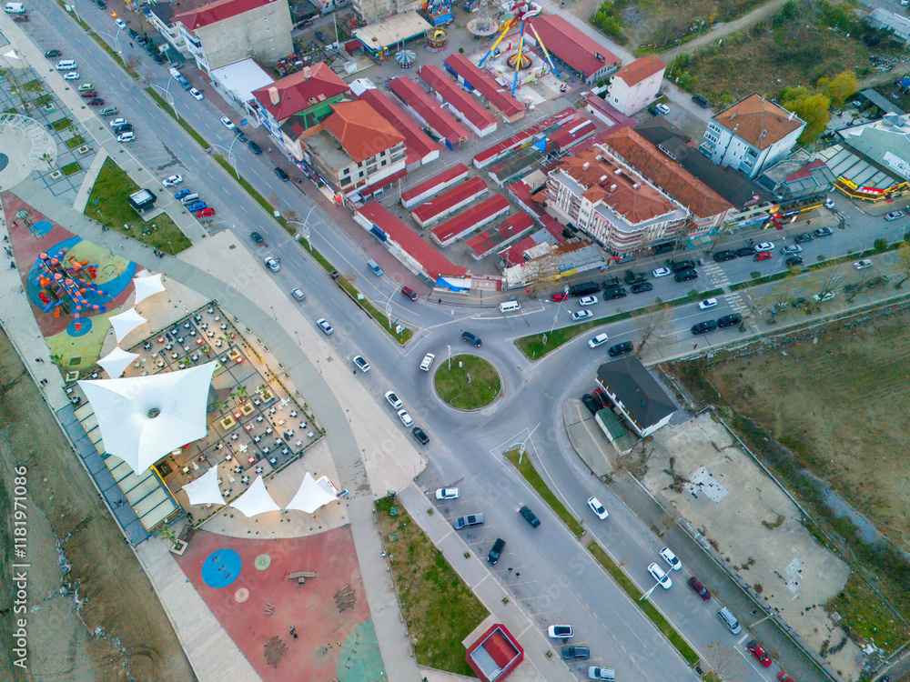 Fototapeta premium Karasu Aerial View of a Coastal Town with Play Area and Eatery. High-angle, full shot of a vibrant coastal town. Sakarya Adapazari Turkiye Turkey Drone shot aerial view
