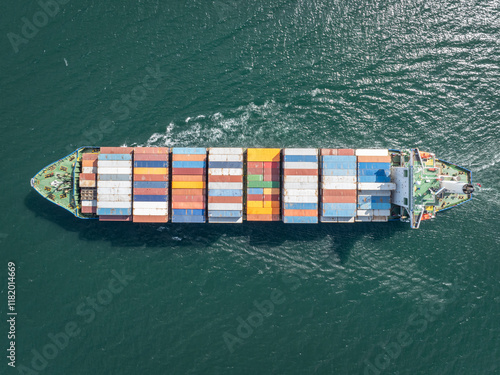 Large container ship at sea. Aerial top view of cargo container ship vessel import export container sailing.