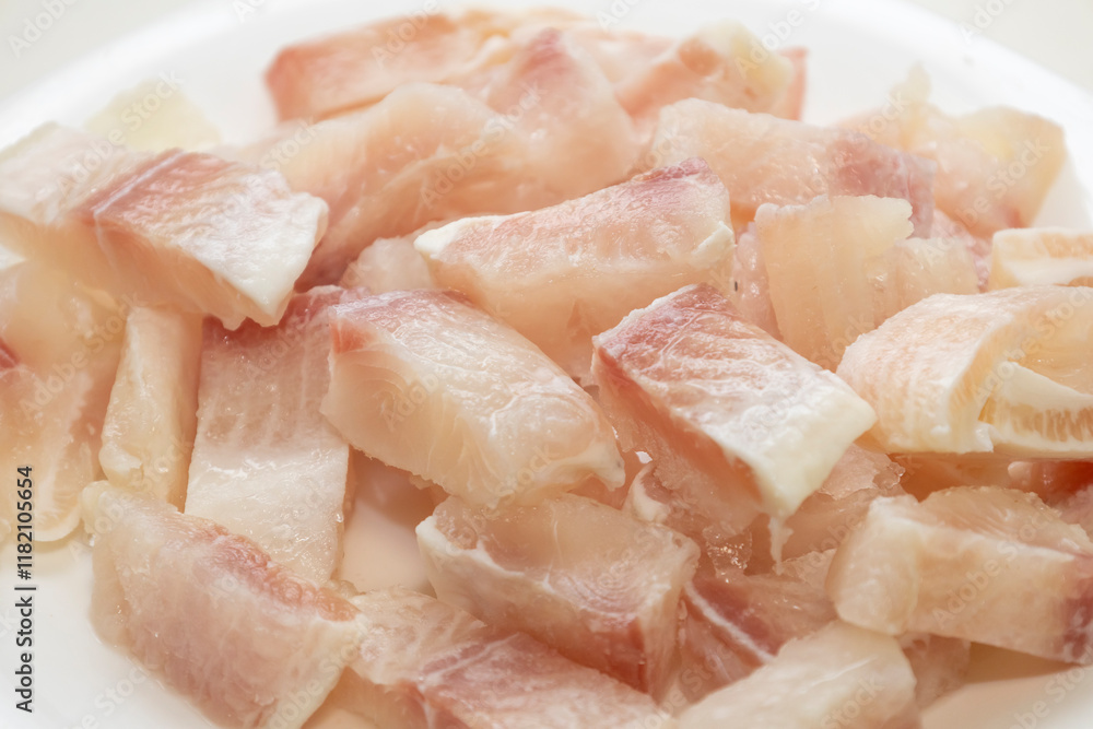 Pangasius fish fillet by pieces. Fresh fish fillet. Pangasius fish fillet by pieces. Fresh fish fillet.