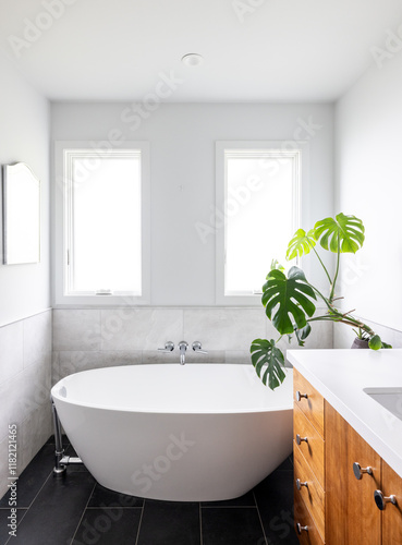 Modern spa bathtub with plants