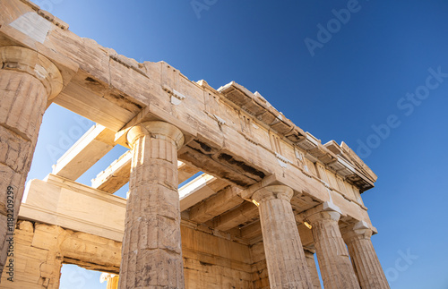 Obraz na płótnie Visit Acropolis hill and the temple of Parthenon. Beautiful view during a sunny day with this heritage landmark of Greek history from Athens. Travel to Greece. w salonie