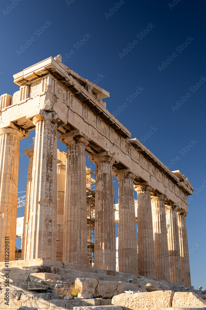 Visit Acropolis hill and the temple of Parthenon. Beautiful view during a sunny day with this heritage landmark of Greek history from Athens. Travel to Greece.