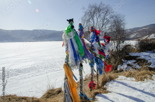 Wooden shaman totems in Baikal, Sludanka town, on Shaman cape photo