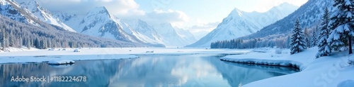 Winter scenery of frozen lake and snow-covered mountains in the Khibiny range, cold weather, icy waters photo