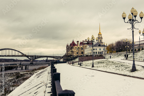 Volga embankment in ancient town of Rybinsk, Russia in early winter photo