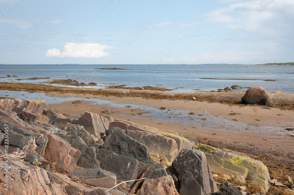 Rocky seashore of the White Sea at low tide, Karelia Rocky seashore of the White Sea at low tide, Karelia
