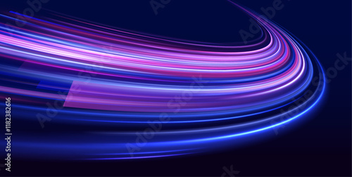A stunning light display of neon trails travels through a dark, abstract landscape, illustrating the breakneck pace of innovation and technological growth.