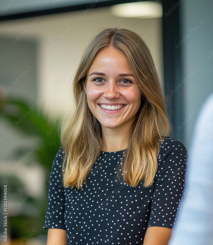a bright smile and polished attire, the young businesswoman creates a welcoming and professional impression making up the good vibe in the office workplace. a bright smile and polished attire, the young businesswoman creates a welcoming and professional impression making up the good vibe in the office workplace.