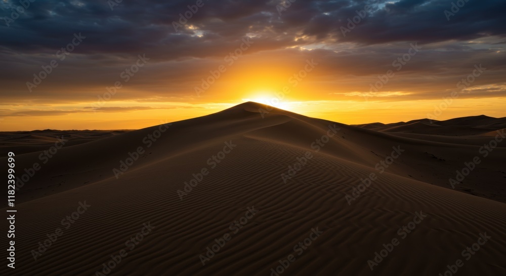 Fototapeta premium Desert sand dune, silhouette against sunset sky, golden hour, dramatic clouds, panoramic landscape, vibrant orange and blue colors, serene atmosphere, vast horizon, nature photography, high contrast, 