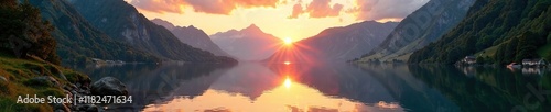 Reflections on the surface of Drachensee at sunset, sunlight, alpine photo