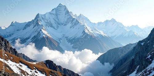 Snow-capped peaks in the Andes are covered in a veil of misty clouds, rugged, natural wonder, alpine photo