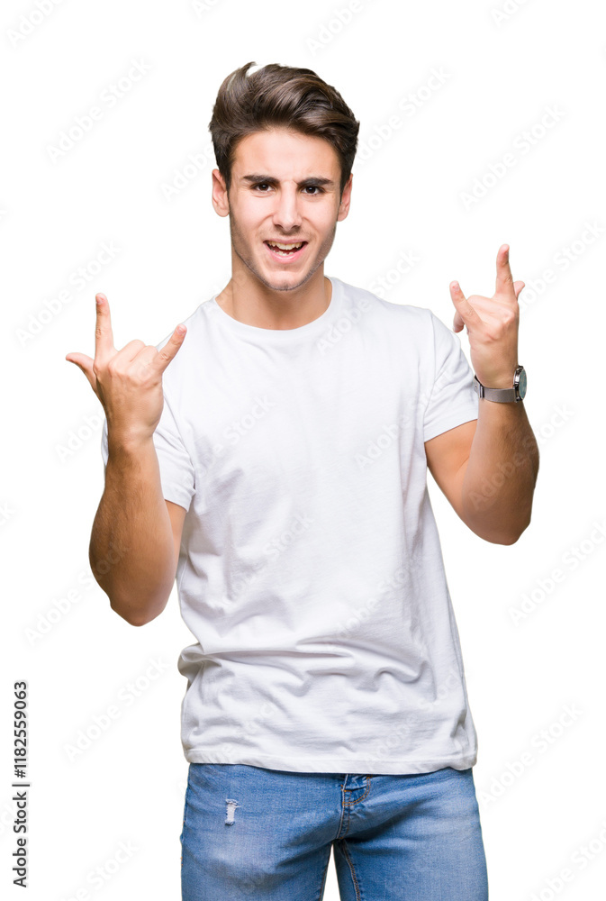 Young handsome man wearing white t-shirt over isolated background shouting with crazy expression doing rock symbol with hands up. Music star. Heavy concept. Young handsome man wearing white t-shirt over isolated background shouting with crazy expression doing rock symbol with hands up. Music star. Heavy concept.
