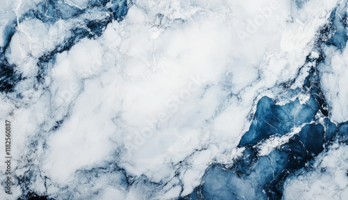 Polished marble stone texture background featuring elegant blue and white veins, perfect for design projects