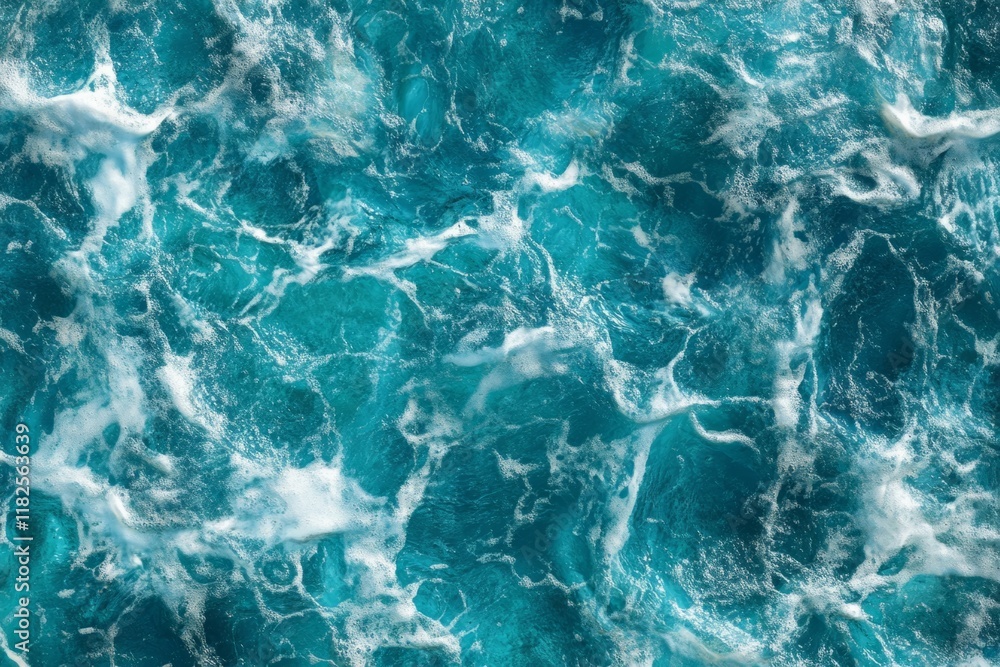 Turquoise ocean water with swirling white foam creates a beautiful natural pattern Turquoise ocean water with swirling white foam creates a beautiful natural pattern